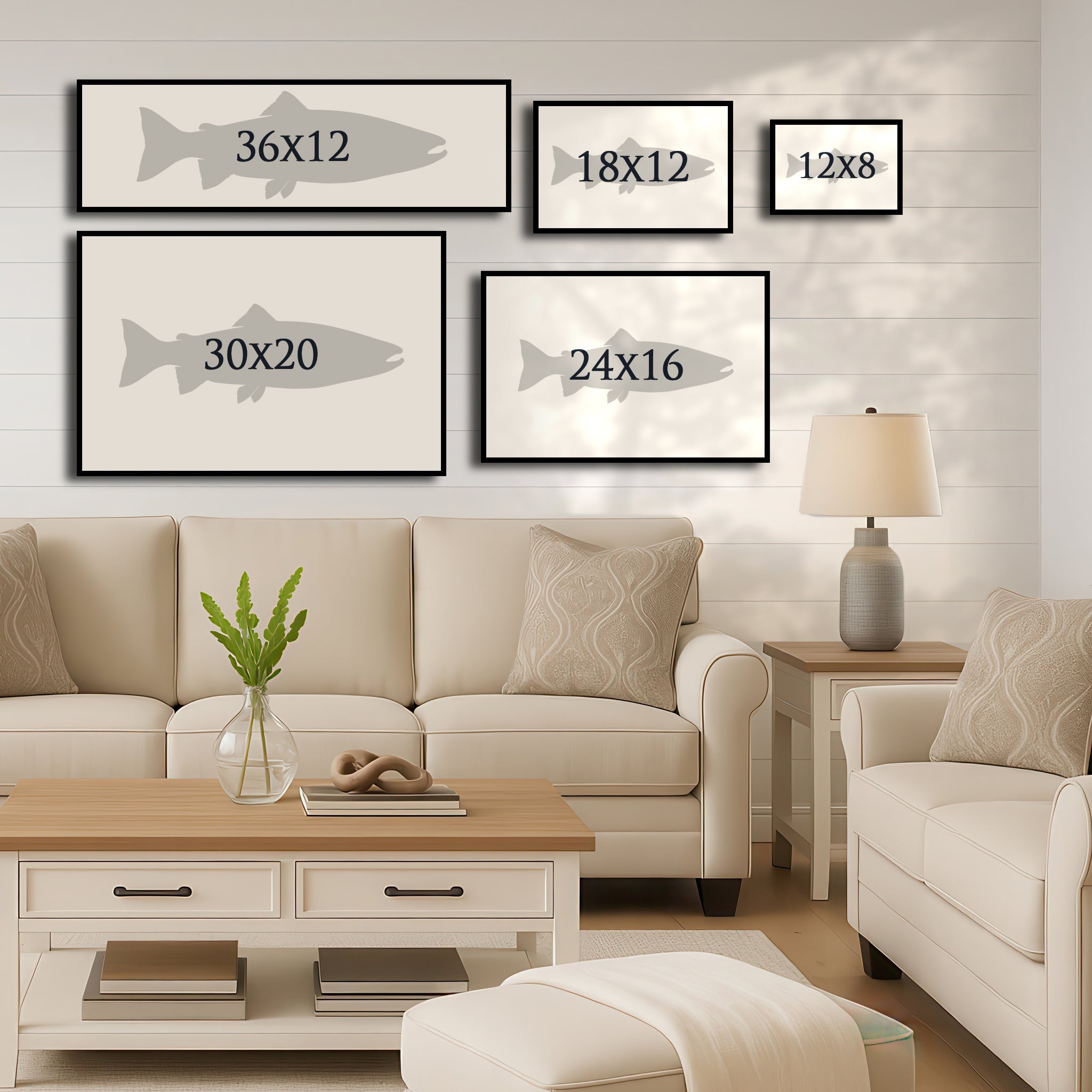 Living room with beige sofa, coffee table, and wall art displaying fish illustrations and dimensions.