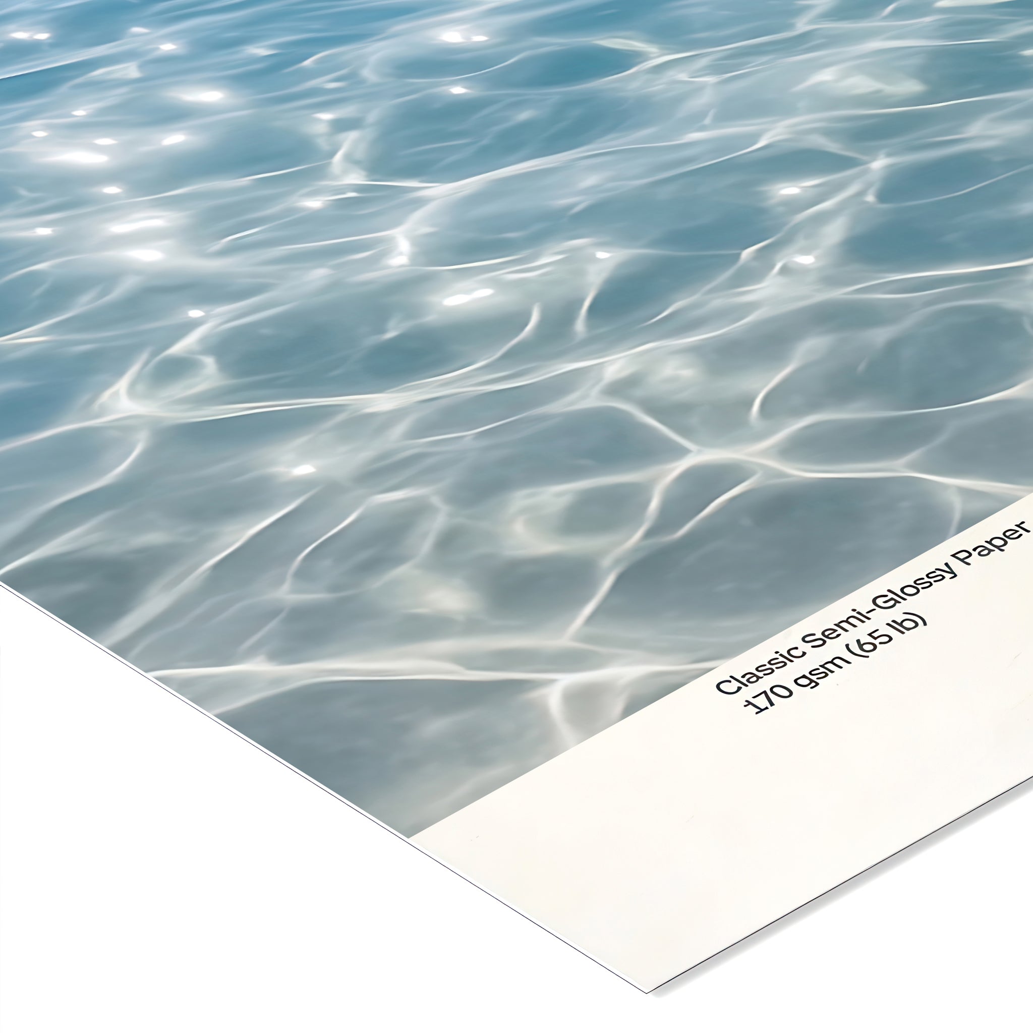 Close-up of water surface with a sheet of Classic Semi-Glossy Paper partially covering it.